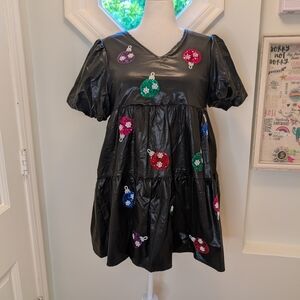 Black Dress with Colorful Ornament Accents